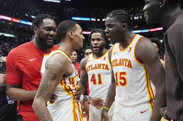 Murray hits 3 pointer with 2 seconds left to lift Hawks past Heat